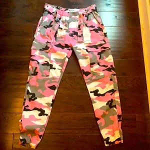 Rue 21’s Pink,black, and white camouflage pants